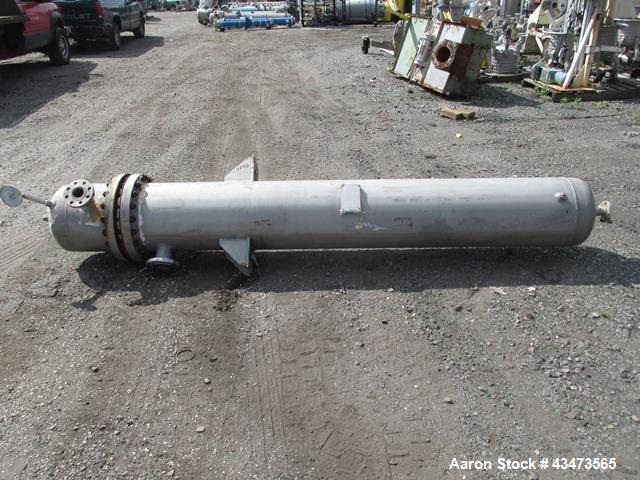 Used Ketema U Tube Heat Exchanger, 239 Square Feet, Model 15-A-96. 316L Stainless steel tubes, tube sheet, bonnet and shell. (72) 0.625" Diameter tubes rated 150 psi at +608/-76 degrees F. Shell rate...