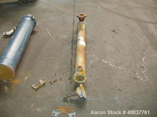 Used Ketema Shell and Tube Heat Exchanger, 20 square feet. 316 stainless steel tubes, tube sheets and bonnets with (52) 3/8" diameter x 48" long tubes rated 200 psi @ 300 degrees F, carbon steel shel...