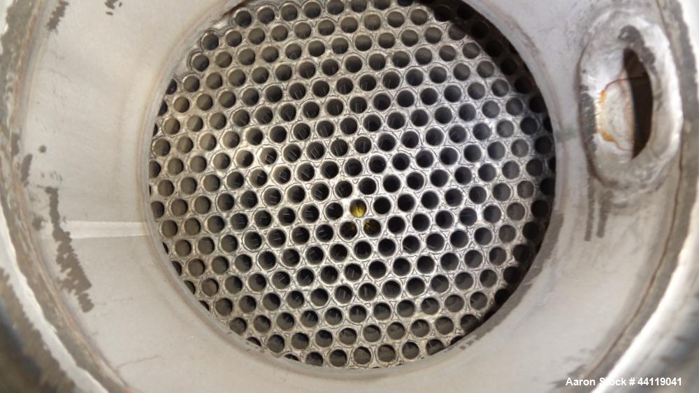 Used Mason Single Pass Shell & Tube Heat Exchanger, 448 Square Feet, Vertical. Carbon steel shell rated 100psi at -20 to 200 degrees F., (305) 5/8" diameter x 8 long 316L stainless steel tubes rated ...