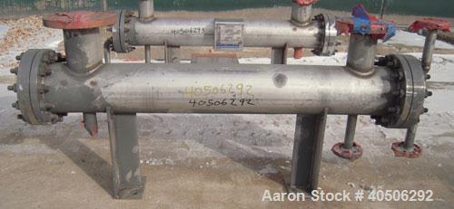 Unused- Mueller 4 Pass Shell And Tube Heat Exchanger, 9 square feet, Horizontal. Tema Type BEM, Tema Size 6-48, Tema Class C. 304 stainless steel shell rated 150 psi at 400 deg.f., and -20 deg.f. at ...