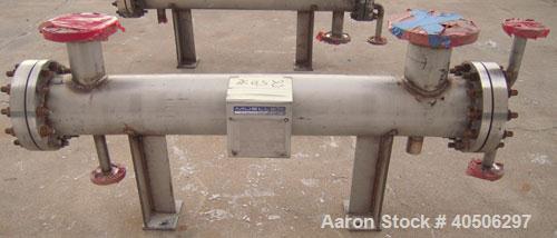 Unused- Mueller 4 Pass Shell And Tube Heat Exchanger, 9 square feet, Horizontal. Tema Type BEM, Tema Size 6-48, Tema Class C. 304 stainless steel shell rated 150 psi at 400 deg.f., and -20 deg.f. at ...