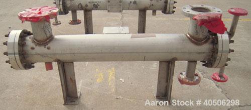Unused- Mueller 4 Pass Shell And Tube Heat Exchanger, 9 Square Feet, Horizontal. STI Tema Type BEM, Tema Size 6-48, Tema Class C. 304 stainless steel shell rated 150 psi at 400 deg.f., and -20 deg.f....