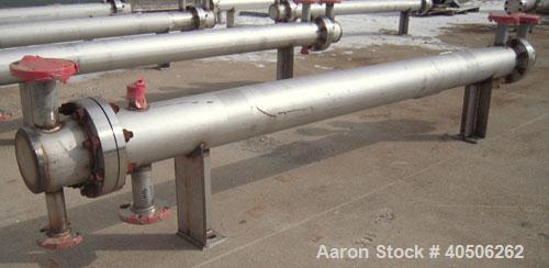 Unused- Mueller Single Pass Shell and Tube Heat Exchanger, 42 square feet, horizontal. Tema Type BEM, Tema Size 6-96, Tema Class C. 304 stainless steel shell rated 150 psi at 200 deg F and -20 deg F ...