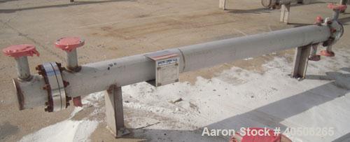 Unused- Mueller Single Pass Shell and Tube Heat Exchanger, 42 square feet, horizontal. Tema Type BEM, Tema Size 6-96, Tema Class C. 304 stainless steel shell rated 150 psi at 200 deg F and -20 deg F ...