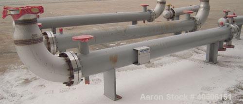 Unused- Mueller Single Pass Shell and Tube Heat Exchanger, 77 square feet, horizontal. STI Tema Type BEU, Tema Size 8-108, Tema Class C. SA53 carbon steel shell rated 150 psi at 200 deg F, and -20 de...