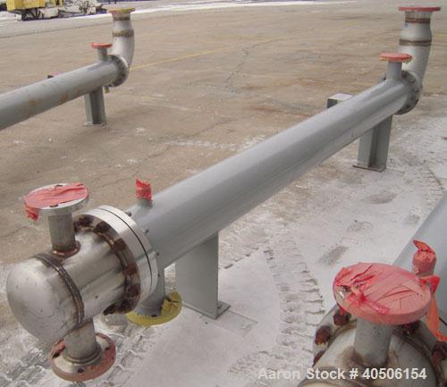 Unused- Mueller Single Pass Shell and Tube Heat Exchanger, 77 square feet, horizontal. STI Tema Type BEU, Tema Size 8-108, Tema Class C. SA53 carbon steel shell rated 150 psi at 200 deg F, and -20 de...