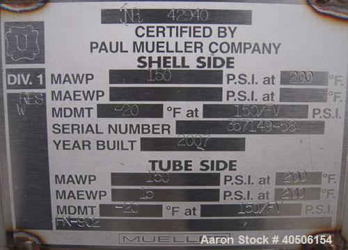 Unused- Mueller Single Pass Shell and Tube Heat Exchanger, 77 square feet, horizontal. STI Tema Type BEU, Tema Size 8-108, Tema Class C. SA53 carbon steel shell rated 150 psi at 200 deg F, and -20 de...