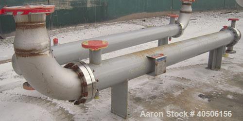 Unused- Mueller Single Pass Shell and Tube Heat Exchanger, 77 square Feet, horizontal. STI Tema Type BEU, Tema Size 8-108, Tema Class C. SA53 carbon steel shell rated 150 psi at 200 deg F and -20 deg...