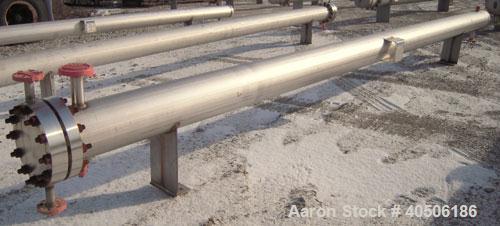 Unused- Mueller 6 Pass U Tube Shell and Tube Heat Exchanger, 84 square feet, horizontal. Tema Type BEU, Tema Size 8-216, Tema Class C. 304 stainless steel shell rated 150 psi at 300 deg F and -20 deg...
