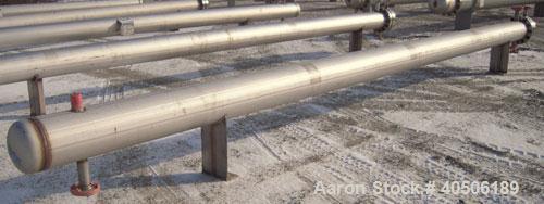 Unused- Mueller 6 Pass U Tube Shell and Tube Heat Exchanger, 84 square feet, horizontal. Tema Type BEU, Tema Size 8-216, Tema Class C. 304 stainless steel shell rated 150 psi at 300 deg F and -20 deg...