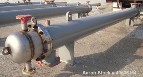 Unused- Mueller Shell and Tube Heat Exchanger, 341 square feet, horizontal. Carbon steel shell rated 150 psi at 200 deg F and -20 deg F at 150 psi. (109) 3/4" diameter x 16' long 304 stainless steel ...