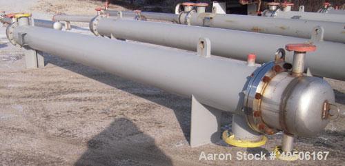 Unused- Mueller Shell and Tube Heat Exchanger, 341 square feet, horizontal. Carbon steel shell rated 150 psi at 200 deg F and -20 deg F at 150 psi. (109) 3/4" diameter x 16' long 304 stainless steel ...