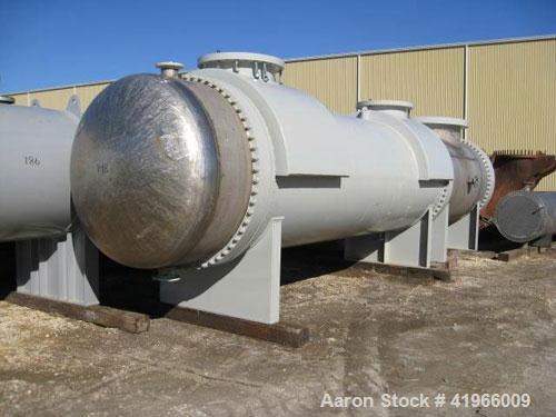 Unused- Heat Transfer Systems Single Pass Shell and Tube Heat Exchanger, 10259 square feet, horizontal, type AEM 71-216. Carbon steel shell rated FV/150 psi at -20 to 200 deg F. (1785) 1-1/4'' diamet...