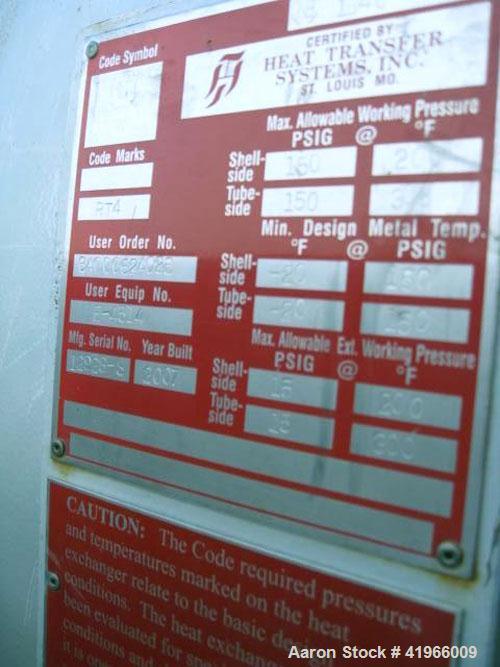 Unused- Heat Transfer Systems Single Pass Shell and Tube Heat Exchanger, 10259 square feet, horizontal, type AEM 71-216. Carbon steel shell rated FV/150 psi at -20 to 200 deg F. (1785) 1-1/4'' diamet...