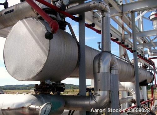 Used Enerquip Shell & Tube Heat Exchanger, Approximately 423 Square Feet, Stainless Steel, Horizontal. Type BEM-14-216. 304L Stainless steel shell rated 75 psi & Full Vacuum at 150 degrees F. (120) 3...