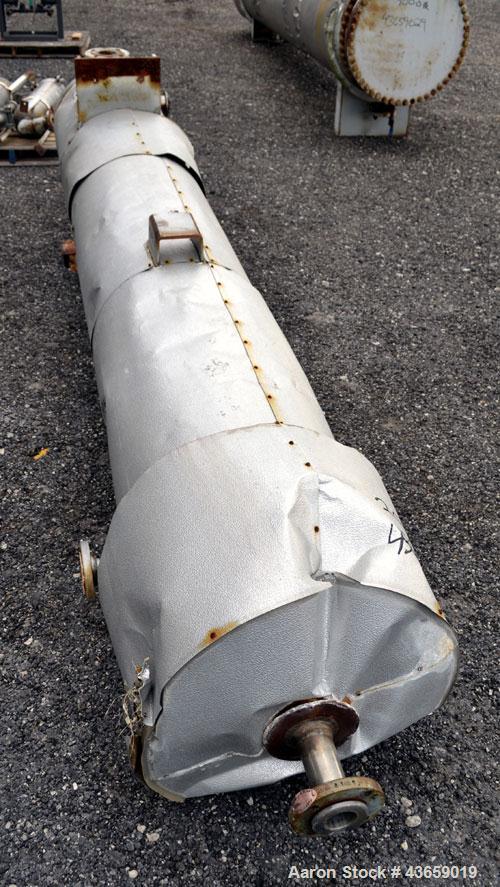 Used Enerquip Shell & Tube Heat Exchanger, Approximately 307.7 Square Feet, Vertical. Type BEM-16-120. Carbon steel shell rated 150 psi & Full Vacuum at 365 degrees F. (157) 3/4" Diameter x 120" long...