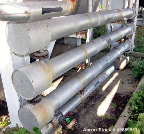Used Enerquip Shell & Tube Heat Exchanger, Approximately 39.9 Square Feet, Stainless Steel, Horizontal. Type BEM-3-120. 304L Stainless steel shell rated 150 psi & Full Vacuum at 300 degrees F. (61) 1...