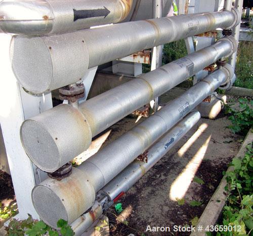 Used Enerquip Shell & Tube Heat Exchanger, Approximately 39.9 Square Feet, Stainless Steel, Horizontal. Type BEM-3-120. 304L Stainless steel shell rated 150 psi & Full Vacuum at 300 degrees F. (61) 1...
