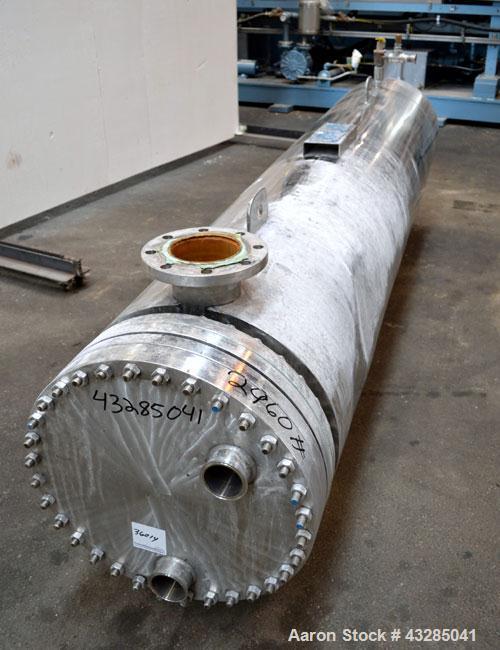 Used Yula U Tube Shell & Tube Heat Exchanger, 672 Square Feet, Model WCV-8J-108AA2S. 316L Stainless steel tubes, tube sheet and bonnet. (321) U tubes rated 150 psi at 350 degrees F., 304 stainless st...