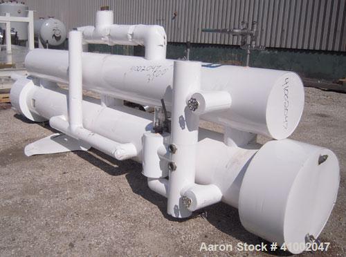 Used Isotherm Multiple Pass Shell and Tube Heat Exchanger, 441 Square Feet, Horizontal, Model ZFC-1615D. Carbon steel shell rated 250 psi at 200 deg F, and -20 deg F at 250 psi, (150) ¾’’ diameter x ...
