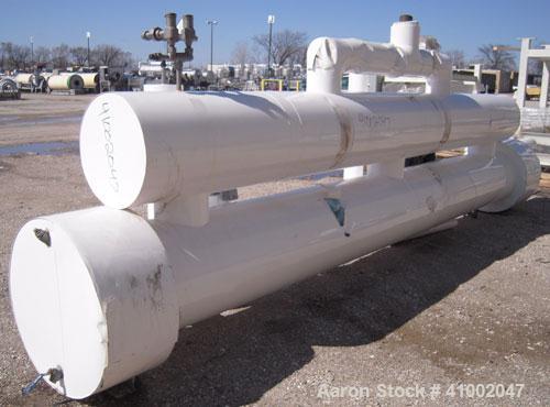 Used Isotherm Multiple Pass Shell and Tube Heat Exchanger, 441 Square Feet, Horizontal, Model ZFC-1615D. Carbon steel shell rated 250 psi at 200 deg F, and -20 deg F at 250 psi, (150) ¾’’ diameter x ...