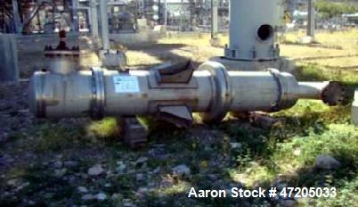 Unused- Perry Products Shell and Tube Heat Exchanger, 624 Square Foot, Model FTS-24-624, Vertical. 304L Stainless steel shell rated 153 psi/FV at -50 to 400 degrees F. (406) 3/4" Diameter x 8' long 3...