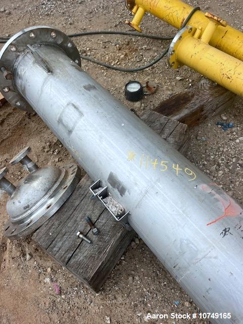 Used Perry Products 225 sq. ft. Vertical Shell and Tube Heat Exchanger. 304L Stainless steel tubes rated 75 psi at 0 to 320 degrees F, 11' Tube length, 104 tube holes. 1' Shell diameter. Stainless st...
