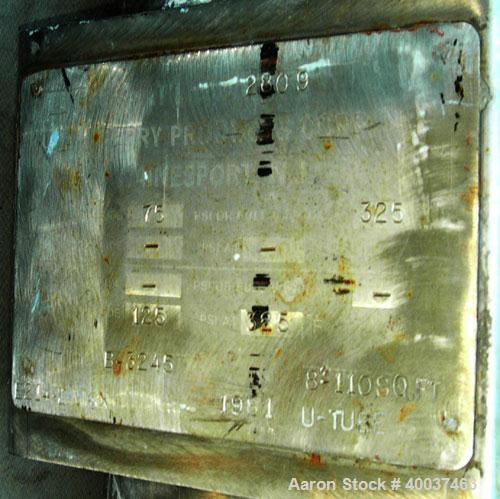 Used Perry Products "U" Tube Heat Exchanger, 110 square feet, horizontal. 316L stainless steel shell rated 75 psi or FV at 325 deg F, (21) 3/4" diameter x 14' long 316L stainless steel tubes rated 12...