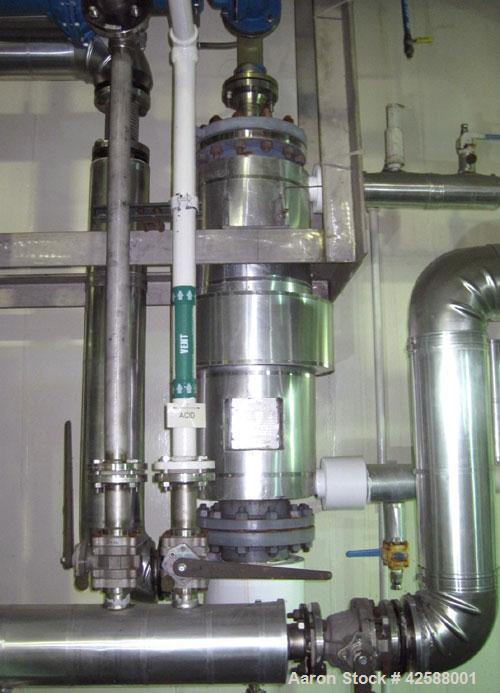 Used Pfaudler Single Pass Shell & Tube Heat Exchanger, 15.2 square feet, vertical. Carbon steel shell rated 100 psi at -20 to 400 deg F. (26) 3/4" Diameter x 3’ long 316L stainless steel tubes rated ...