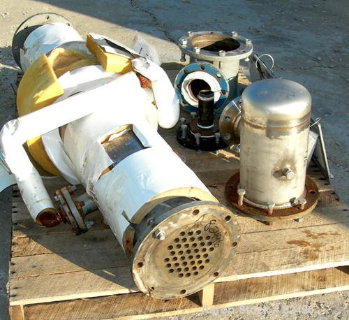 USED: Roben shell and tube heat exchanger, 36 sq ft, 304 stainless steel. 2 piece bolt together carbon steel shell rated 50 psi at 300 deg F, (40) 5/8" diameter x 5' long tubes rated 50 psi at 300 de...