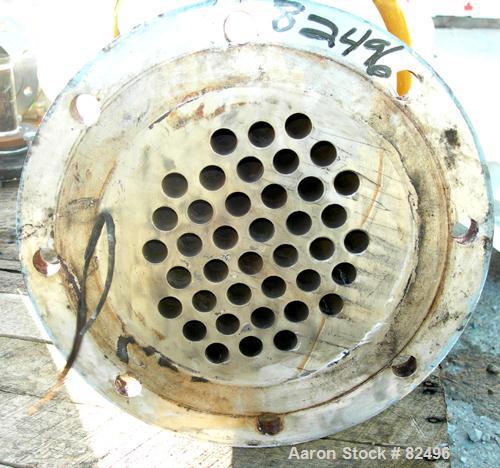 USED: Roben shell and tube heat exchanger, 36 sq ft, 304 stainless steel. 2 piece bolt together carbon steel shell rated 50 psi at 300 deg F, (40) 5/8" diameter x 5' long tubes rated 50 psi at 300 de...