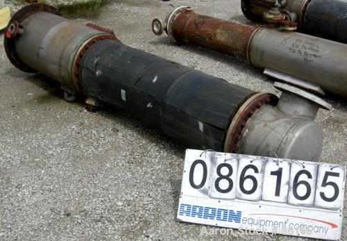 USED: Roben single pass shell and tube heat exchanger, 200 square feet, vertical. Carbon steel shell rated 100 psi at 212 deg F, (204) 3/4" diameter x 5' long 316 stainless steel tubes rated 50 psi/F...