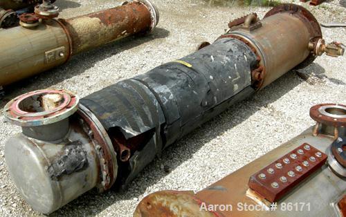 USED: Roben single pass shell and tube heat exchanger, 199 square feet, vertical. Carbon steel shell rated 100 psi at 212 deg F, (204) 3/4" diameter x 5' long 316 stainless steel tubes rated 50 psi/F...