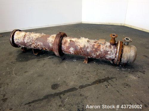 Used Rubicon Industries Multiple Pass Shell & Tube Heat Exchanger, 324 Square Feet, Model SC16B4-108HE, Horizontal. Carbon steel shell rated 150 psi at -20 to 400 degrees F. (184) 3/4" diameter x 108...