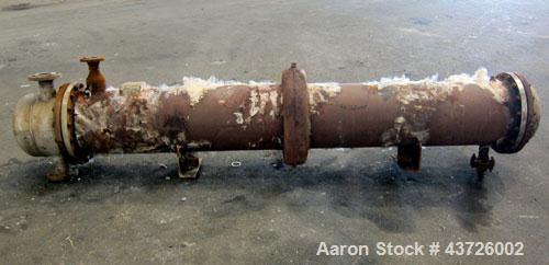 Used Rubicon Industries Multiple Pass Shell & Tube Heat Exchanger, 324 Square Feet, Model SC16B4-108HE, Horizontal. Carbon steel shell rated 150 psi at -20 to 400 degrees F. (184) 3/4" diameter x 108...