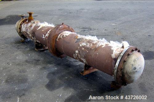Used Rubicon Industries Multiple Pass Shell & Tube Heat Exchanger, 324 Square Feet, Model SC16B4-108HE, Horizontal. Carbon steel shell rated 150 psi at -20 to 400 degrees F. (184) 3/4" diameter x 108...