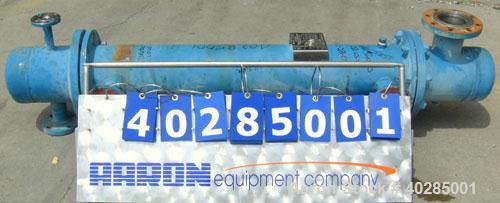 Used Rubicon shell and tube heat exchanger, model VT8A1-48H, 48 square feet, horizontal. Carbon steel shell rated 150 psi at 400 deg F. (73) 9/16" diameter x 48" long, 316L stainless steel, tubes rat...