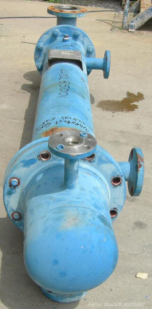Used Rubicon shell and tube heat exchanger, model VT8A1-48H, 48 square feet, horizontal. Carbon steel shell rated 150 psi at 400 deg F. (73) 9/16" diameter x 48" long, 316L stainless steel, tubes rat...