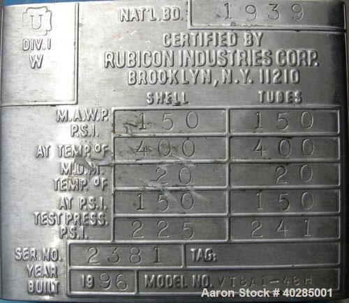 Used Rubicon shell and tube heat exchanger, model VT8A1-48H, 48 square feet, horizontal. Carbon steel shell rated 150 psi at 400 deg F. (73) 9/16" diameter x 48" long, 316L stainless steel, tubes rat...