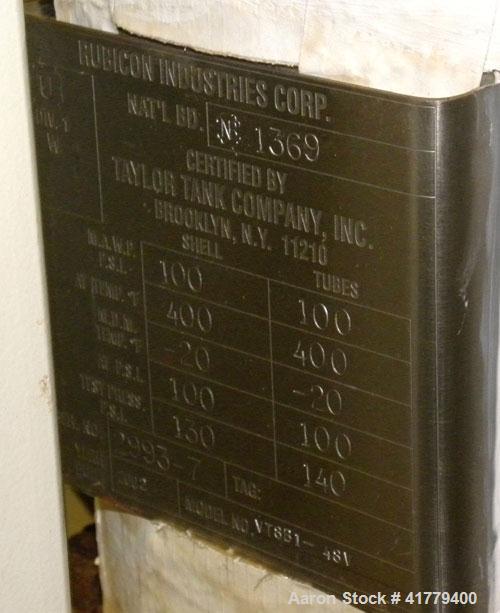 Used Rubicon Single Pass Shell And Tube Heat Exchanger, 37 Square Feet, Vertical. Model VT8B1-48V. Carbon stel shell rated 100 psi at -20 to 400 deg.f.. (48) 3/4" diameter x 4’ long  tubes rated 100 ...