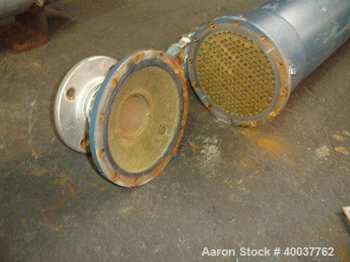 Used ITT Shell and Tube Heat Exchanger, 82 Sq. Ft. , 316 stainless steel tubes, tube sheets, bonnets and shell with (210) 3/8" diameter x 48" long tubes rated 150 PSI @ 450 degrees F., shell rated 22...