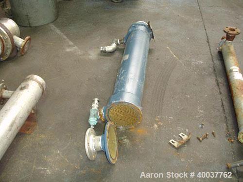 Used ITT Shell and Tube Heat Exchanger, 82 Sq. Ft. , 316 stainless steel tubes, tube sheets, bonnets and shell with (210) 3/8" diameter x 48" long tubes rated 150 PSI @ 450 degrees F., shell rated 22...