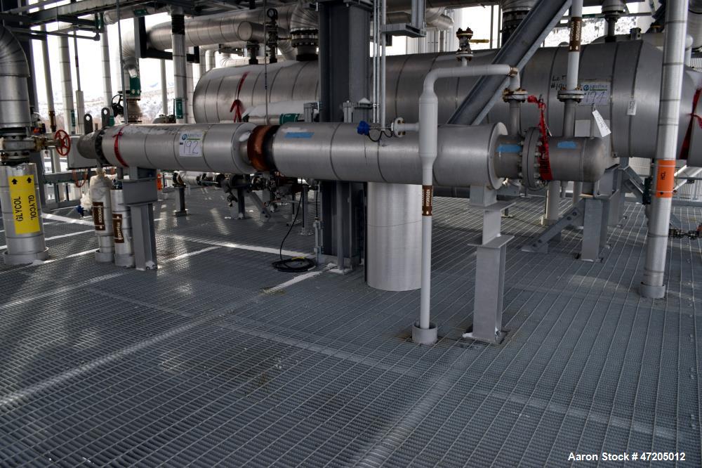 Unused- Steeltek Single Pass Shell & Tube Heat Exchanger, 166 Square Feet, Type BEM, Size 10-168, Horizontal. 304L Stainless steel shell rated 160 psi/Full Vacuum at -50 to 400 degrees F. (61) 3/4" D...