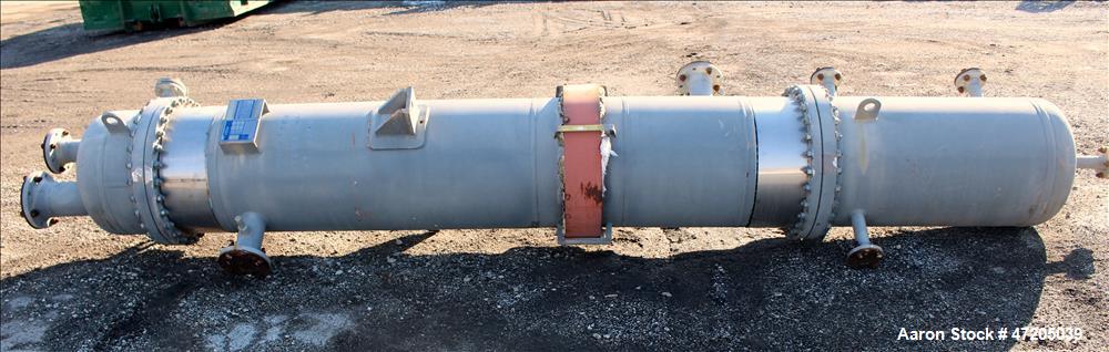 Unused- Steeltek 2 Pass Shell & Tube Heat Exchanger, 496 Square Feet, Type BEM, Size 23-9, Vertical. 304L Stainless Steel shell rated 165 psi at -30 to 250 degrees F. (262) 1" Diameter x 8' long 304L...