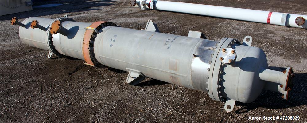 Unused- Steeltek 2 Pass Shell & Tube Heat Exchanger, 496 Square Feet, Type BEM, Size 23-9, Vertical. 304L Stainless Steel shell rated 165 psi at -30 to 250 degrees F. (262) 1" Diameter x 8' long 304L...