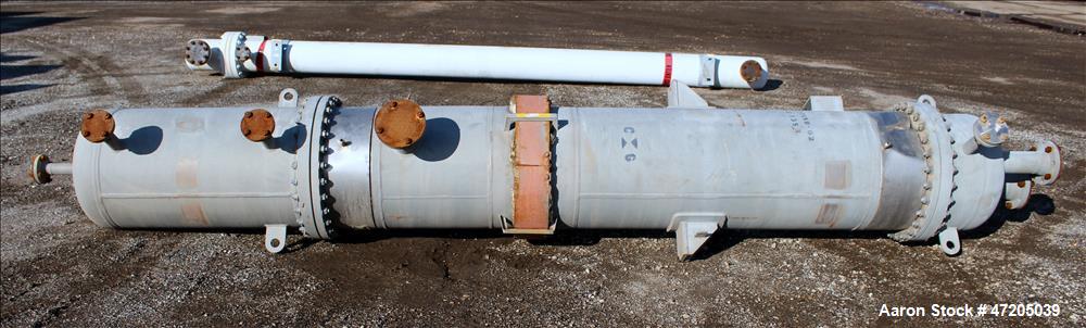 Unused- Steeltek 2 Pass Shell & Tube Heat Exchanger, 496 Square Feet, Type BEM, Size 23-9, Vertical. 304L Stainless Steel shell rated 165 psi at -30 to 250 degrees F. (262) 1" Diameter x 8' long 304L...