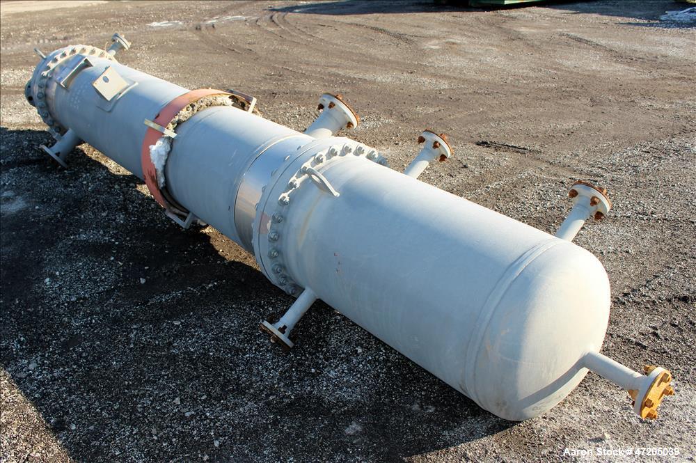 Unused- Steeltek 2 Pass Shell & Tube Heat Exchanger, 496 Square Feet, Type BEM, Size 23-9, Vertical. 304L Stainless Steel shell rated 165 psi at -30 to 250 degrees F. (262) 1" Diameter x 8' long 304L...