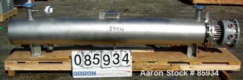Unused- Watlow Shell and Tube Heat Exchanger, 63.5 Square Feet, Horizontal. Rated 100 PSI at 400 Degrees F. 310 stainless steel tubes.  3" inlet/outlet. Includes an electric heater control panel, 210...