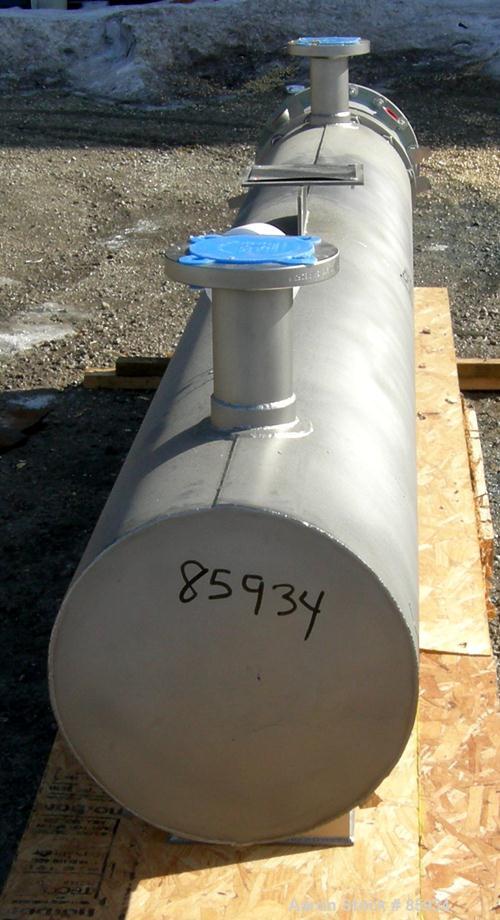 Unused- Watlow Shell and Tube Heat Exchanger, 63.5 Square Feet, Horizontal. Rated 100 PSI at 400 Degrees F. 310 stainless steel tubes.  3" inlet/outlet. Includes an electric heater control panel, 210...