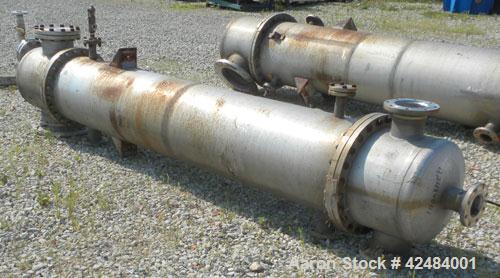 Used Wolfe Mechanical and Equipment Single Pass Shell and Tube Heat Exchanger, 784 square feet, vertical. 304 Stainless steel shell rated 100 psi at 300 degrees F. (400) 3/4'' Diameter x 120’' long 3...